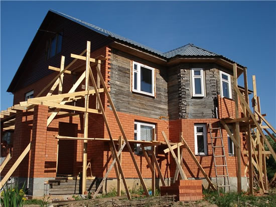 Обкладка дома кирпичем